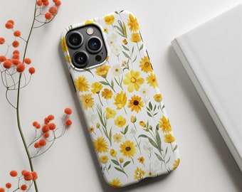 Puede incluir: Una funda de teléfono blanca con un patrón floral con flores amarillas y blancas sobre un fondo blanco.
