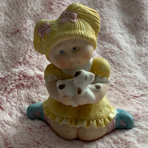 Vintage ceramic Cabbage Patch Kids sitting kid figurine
