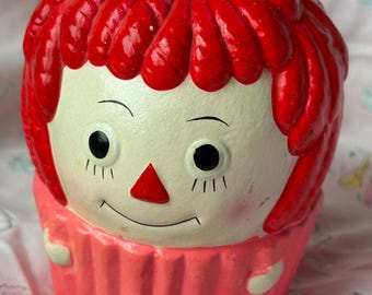 Vintage Raggedy Ann cupcake money bank, doll figurine