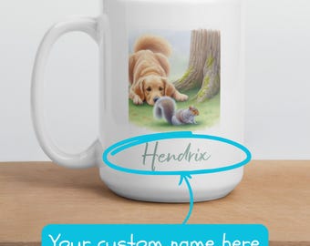 May include: White ceramic mug with a colorful illustration of a golden retriever dog looking at a gray squirrel. The text "Hendrix" is written in a blue oval on the mug.