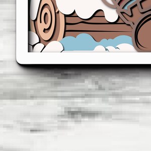 May include: A layered paper art piece featuring a brown wooden log design with a circular cross-section, accented by white cloud-like shapes and light blue waves, all enclosed within a clean white rectangular frame border.