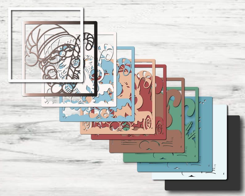May include: A layered square craft design featuring a Santa Claus figure with a candy cane, presented in a series of overlapping frames in various colors including white, metallic bronze, light blue, peach, red, green, and solid black.