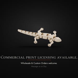 May include: A light-colored, articulated lizard figurine with a segmented body and tail. The text reads: COMMERCIAL PRINT LICENSING AVAILABLE. Wholesale & Custom Orders welcome. Message us on Etsy.
