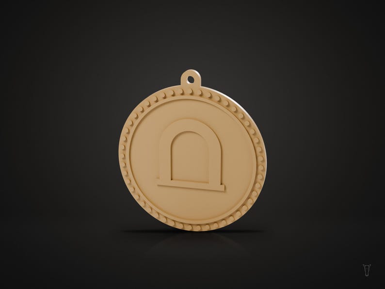 May include: A circular tan pendant featuring a raised archway symbol in the center and a decorative beaded border along the outer edge. The pendant includes a small loop at the top for attachment, presented in a solid, monochromatic tan color.