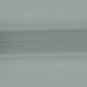 May include: A clear glass cylindrical vial featuring a dark green rubber stopper at one end and a metallic silver neck topped with a small, flat, circular red cap at the opposite end. The vial is empty and has a smooth, transparent body.