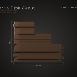May include: A brown Strata Desk Caddy with a tiered, stepped design. The text reads Strata Desk Caddy and Caddy 121 x 80.6 x 96 mm. The dimensions are explicitly labeled as 121 mm in width and 96 mm in height on the dark background.