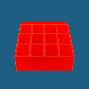 May include: A bright red plastic organizer with 12 compartments. The organizer is perfect for storing small items like jewelry, craft supplies, or office supplies.