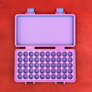 May include: A rectangular light purple storage case with an open lid. The interior base features a grid of forty-eight circular indentations arranged in six rows of eight, designed for holding small items securely within the hard shell container.