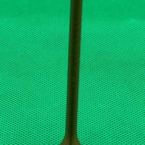 May include: A brown golf tee with a pointed tip and a flared base.