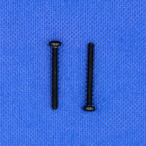 May include: Two black screws with a flat head and a Phillips head on a blue background.