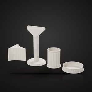 May include: A set of four off-white objects featuring a fluted texture. The collection includes a curved corner piece, a tall pedestal stand with a flat top, a cylindrical container, and a shallow circular tray, all displayed on a dark background.
