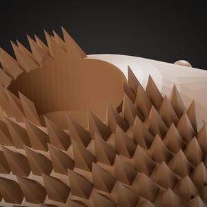 Puede incluir: Una escultura geom&eacute;trica tridimensional de color marr&oacute;n claro con forma de erizo. La figura presenta un hocico plano y liso, y un cuerpo cubierto por numerosas p&uacute;as afiladas, triangulares y con forma de pir&aacute;mide.