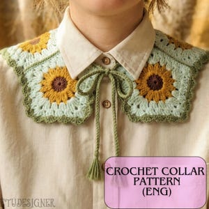 May include: A crocheted collar with a sunflower design in yellow, brown, and light green. The collar is worn over a white collared shirt and has a green tie. The text "CROCHET COLLAR PATTERN (ENG)" is visible.
