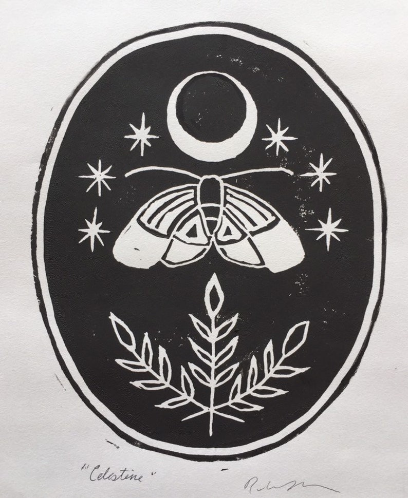 May include: Black and white print of a moth with a crescent moon and stars above it. The moth is centered in the oval-shaped print with a stylized plant below it. The print is signed "Celestine".