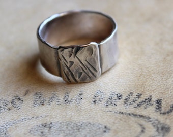 Mens ring of rugged sterling silver