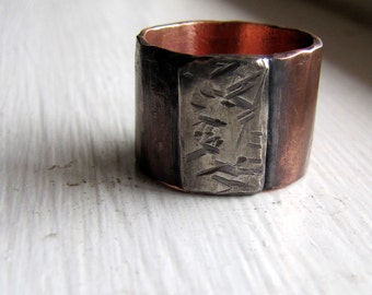 Mens ring of rustic copper and sterling