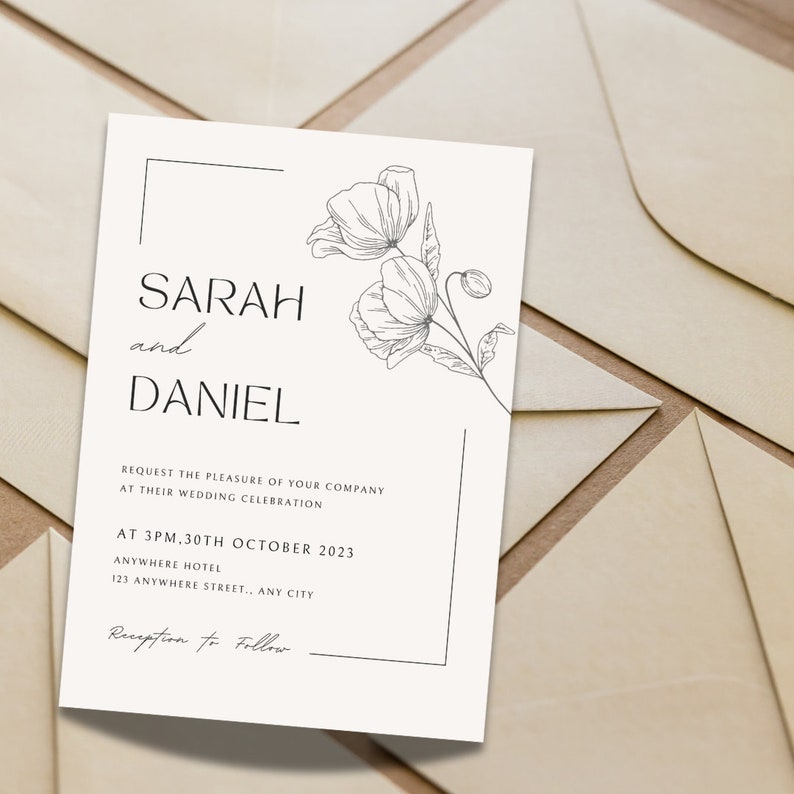 May include: A white wedding invitation with a black border and a simple line drawing of flowers. The invitation reads "Sarah and Daniel" and includes the date and time of the wedding ceremony. The text "Reception to Follow" is handwritten at the bottom of the invitation.