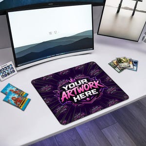 May include: A custom mouse mat featuring the text "YOUR ARTWORK HERE" in pink and white on a purple background. The mat is on a white desk with a computer monitor, trading card packs, and other accessories.