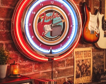 Reloj de pared Fender de 16" con doble neón para salas de música, garajes, salas de juegos, restaurantes y decoración de patios. Un regalo original para amantes de la guitarra y la música.
