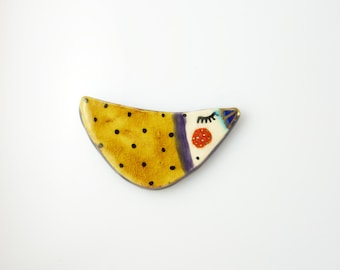 Multicolored bird ceramic brooch with gold dots