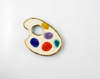 Broche en céramique palette de couleurs beige jaune bleu vert rouge