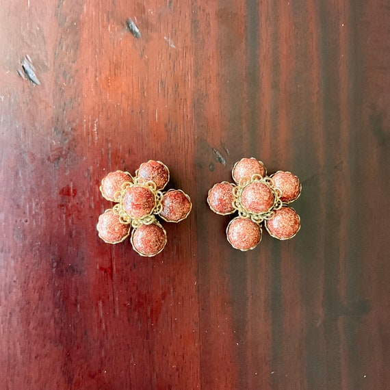 Vintage Red Pink Goldtone Clip-On Earrings. Circular Gemstones. Goldtone Metal. Unsigned. Reddish Pink Gemstones. Sarah Coventry Style. 70s.