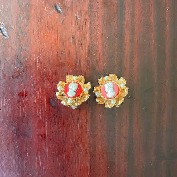 Vintage Plastic Cameo Clip-On Earrings. Floral Frame. Pearl Flourish. Goldtone Metal. Red. White. Gold. Silhouette Jewelry. Costume. 80s.