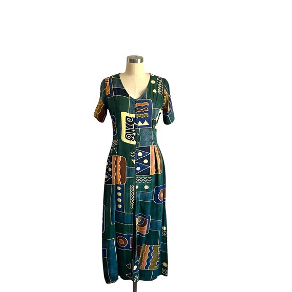 Vintage Earthy Girl Midi Dress. Tropical Tantrum Multicolor Funky-Patterned Midi Dress. Colorful Boho Hippie Button-Up Dress. Short Sleeves.