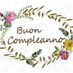 May include: Embroidered greeting card with a floral wreath and the text "Buon Compleanno", which is Italian for "Happy Birthday".