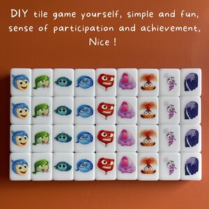 May include: A set of 20 white square tiles with colorful images of characters from the movie Inside Out. Each tile features a different character, including Joy, Sadness, Anger, Fear, and Disgust. The tiles are arranged in four rows of five tiles each.