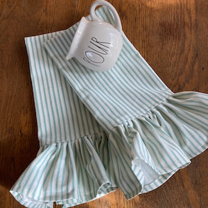 Aqua green ticking towels; towels with ruffles; kitchen towels