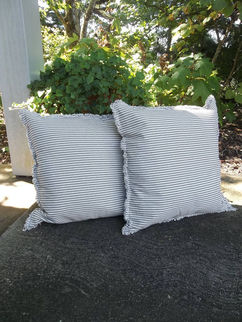 24" blue ticking pillows