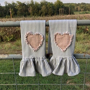 Primitive style ticking towels with frayed edge heart applique
