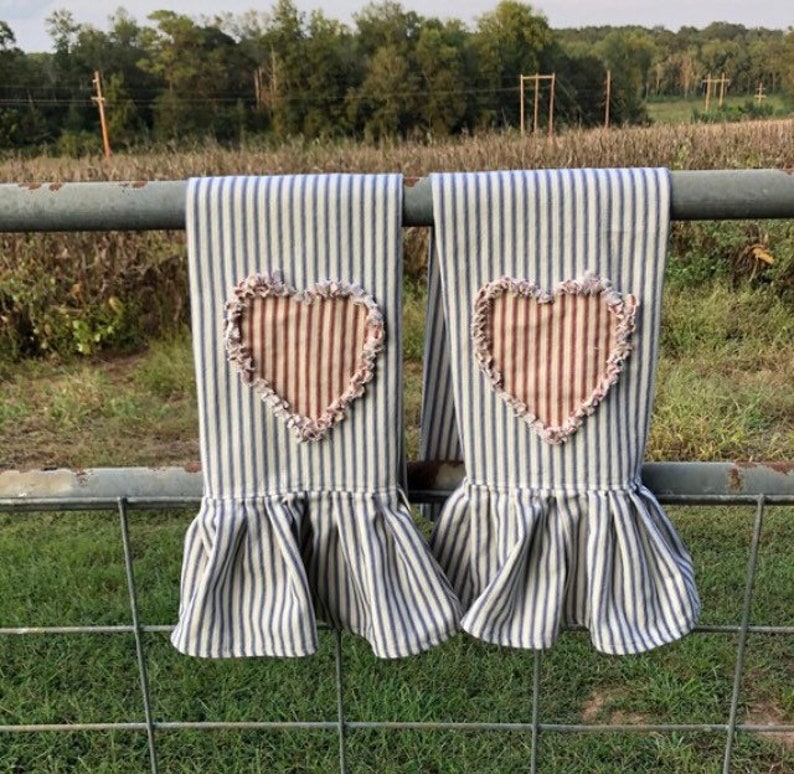 Primitive style ticking towels with frayed edge heart applique