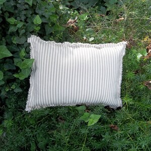 Small lumbar pillow in beige ticking stripe