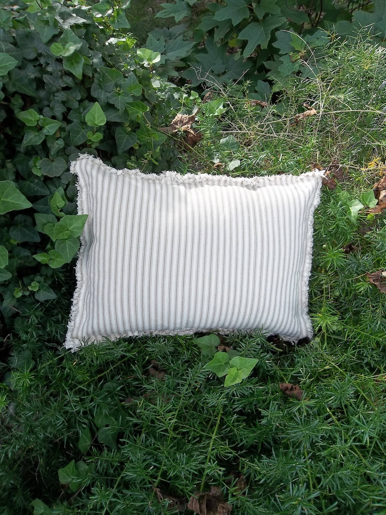 Small lumbar pillow in beige ticking stripe