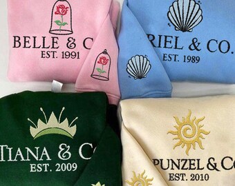 Sudadera bordada de las princesas Bella, Ariel, Tiana y Rapunzel, suéter retro a la moda, perfecto para el armario de cualquier fan de Disney 2025.