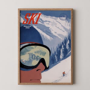 Könnte beinhalten: Gerahmtes Vintage-Ski-Poster mit dem Wort "SKI" in Rot, dem Jahr "1968" und einem Skifahrer auf einem schneebedeckten Berg. Das Poster zeigt einen Skifahrer mit Brille und Helm, mit einer Bergkette im Hintergrund. Das Poster ist in einem Holzrahmen.