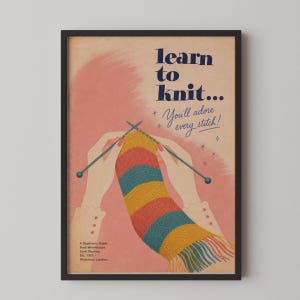 May include: A framed poster with a pink background featuring an illustration of hands knitting a striped scarf in teal, yellow, and red. The text reads: learn to knit... You'll adore every stitch! A Beginners Guide from Wrenthorpe Craft Studios, Est. 1952, Woolwich, London.