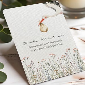May include: A rustic wooden sign with the text "Welcome to our home" in white lettering. The sign features a distressed finish and a simple, inviting design, perfect for front door decor.