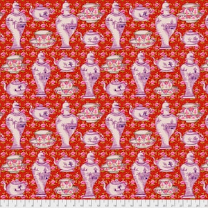 May include: A red fabric with a repeating pattern of white teapots, cups, and vases with a pink floral design. The pattern is on a red background with small pink flowers.