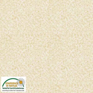 Könnte beinhalten: Ein beigefarbener Stoff mit einem weißen, abstrakten, geometrischen Muster. Der Stoff trägt ein "Confidence in Textiles"-Etikett mit dem Text "Geprüft auf Schadstoffe nach Oeko-Tex® Standard 100".