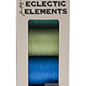 May include: A package of Coats Eclectic Elements Craft Thread. The package contains four spools of 100% cotton thread in shades of blue and green. Each spool contains 50 yards of thread.