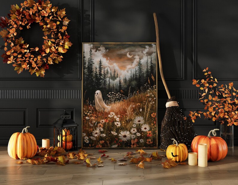 May include: A framed painting of a forest scene with a ghost in the foreground. The painting is surrounded by fall decor, including a wreath, pumpkins, and a broom.