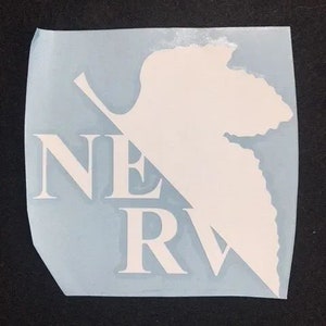 May include: White vinyl sticker with a leaf design and the word "NERV" in a stylized font.
