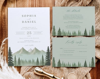 May include: A wedding invitation suite with a forest and mountain landscape design. The invitation card features the names Sophia and Daniel, the date December 25th, and the location Aurora Hall. The RSVP card includes the details of the wedding and a section for guests to reply.