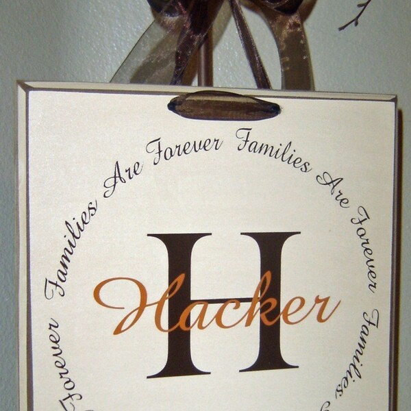 Families are Forever vinyl lettering circle, with your personalized monogram initial and family name on a board w\/ribbon