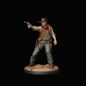 May include: A detailed figurine of a cowboy in a brown hat, vest, and boots, holding a revolver. The cowboy is wearing a red neckerchief, a light-colored shirt, and gray jeans. The figurine is standing on a small, round base with a dark background.