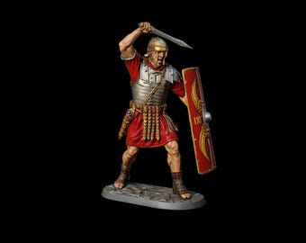 May include: A miniature Roman soldier figurine in a dynamic pose, wielding a sword and shield. The figure is clad in a red tunic, silver armor, and a golden helmet. The shield is red with gold accents and the number IX.