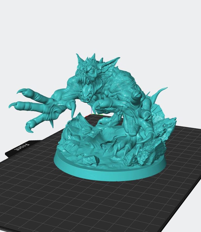 May include: A teal-colored monster figurine with sharp claws, teeth, and a menacing expression. The creature is posed on a rocky base, with the word "FRONT" visible on the base. This detailed sculpture is likely for tabletop gaming or display.